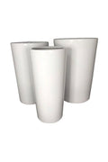 Set of three tall white ceramic plant pots with glossy finish